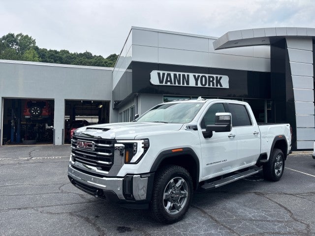 2026 GMC Sierra 2500 HD SLT in Summit White — front three-quarter view