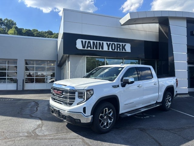 2026 GMC Sierra 1500 SLT in Summit White — front three-quarter view