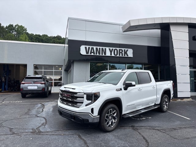 2026 GMC Sierra 1500 SLE in Summit White — front three-quarter view