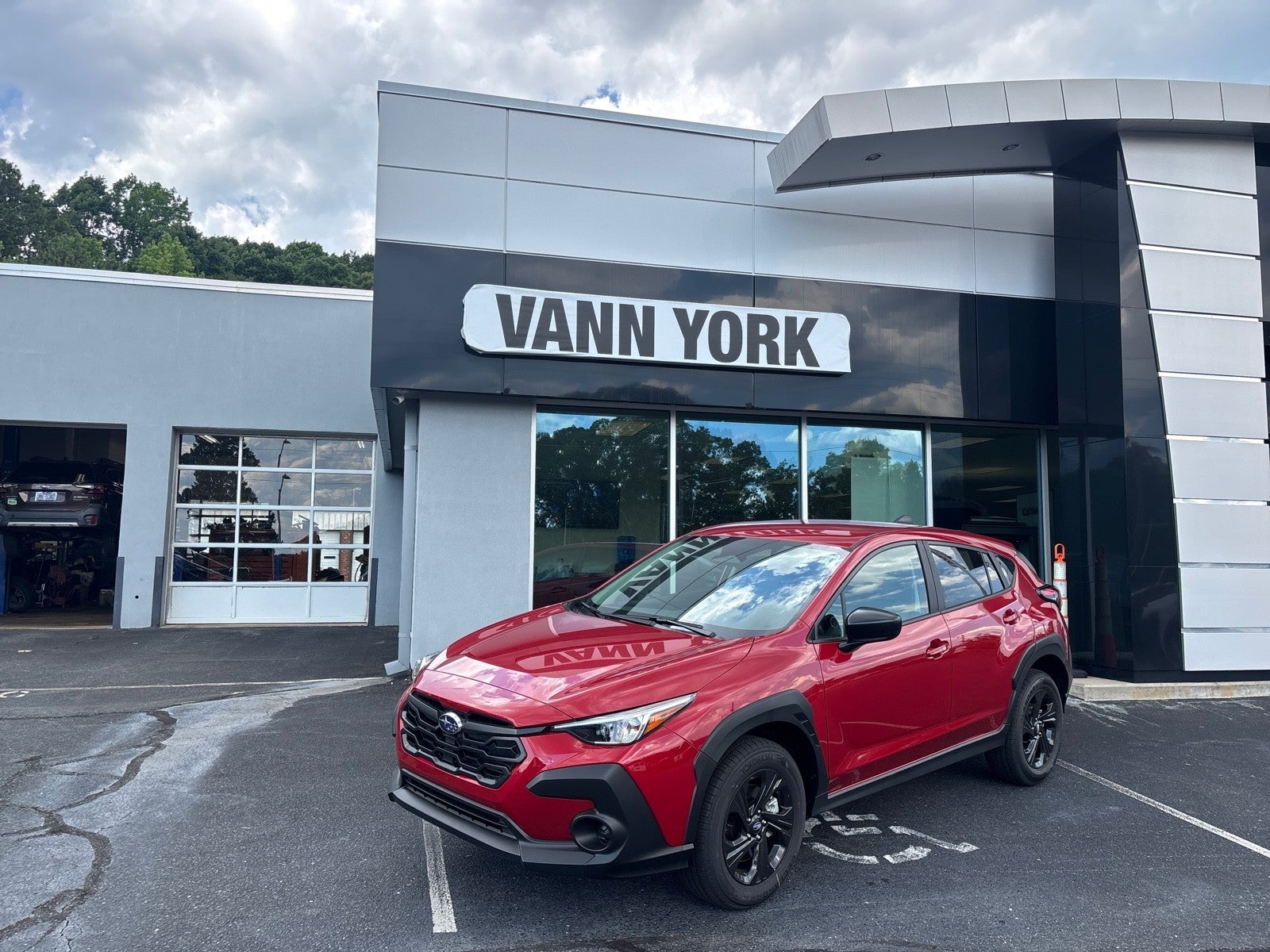 2026 Subaru CROSSTREK Base in Lithium Red Pearl — front three-quarter view