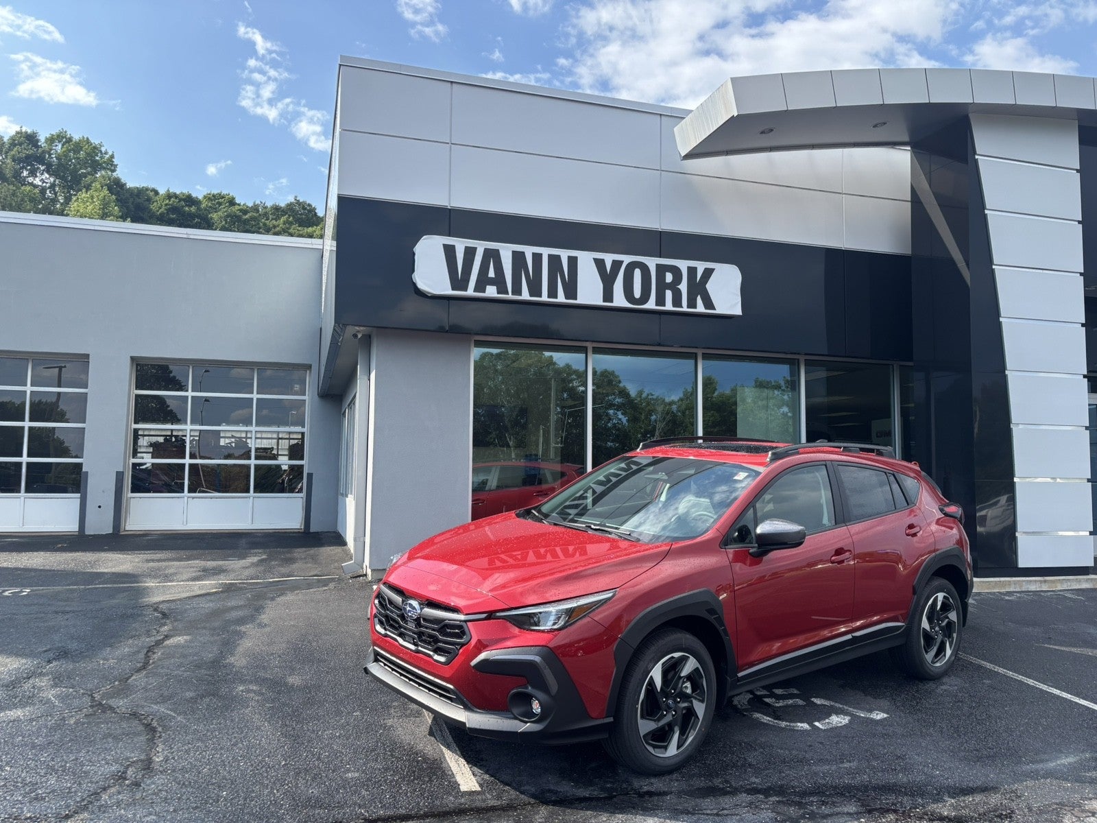 2026 Subaru CROSSTREK Limited in Lithium Red Pearl — front three-quarter view