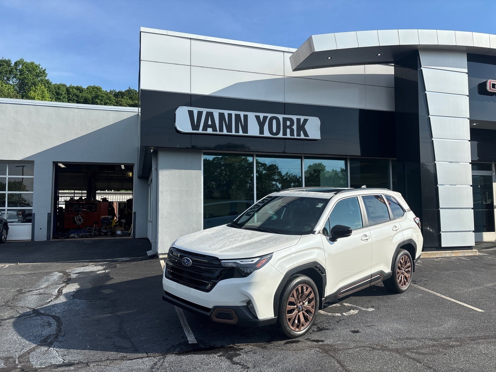 2026 Subaru FORESTER Sport in Crystal White Pearl — front three-quarter view