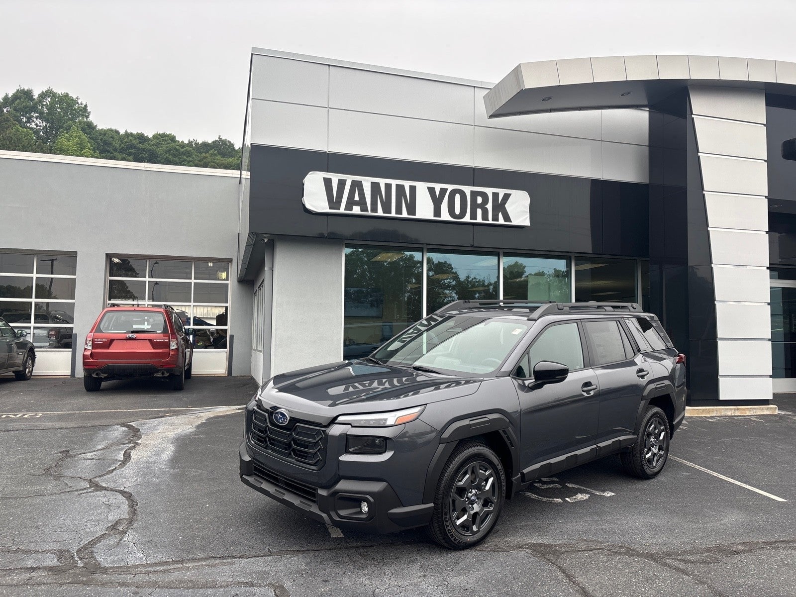 2026 Subaru OUTBACK Premium in Magnetite Gray Metallic — front three-quarter view
