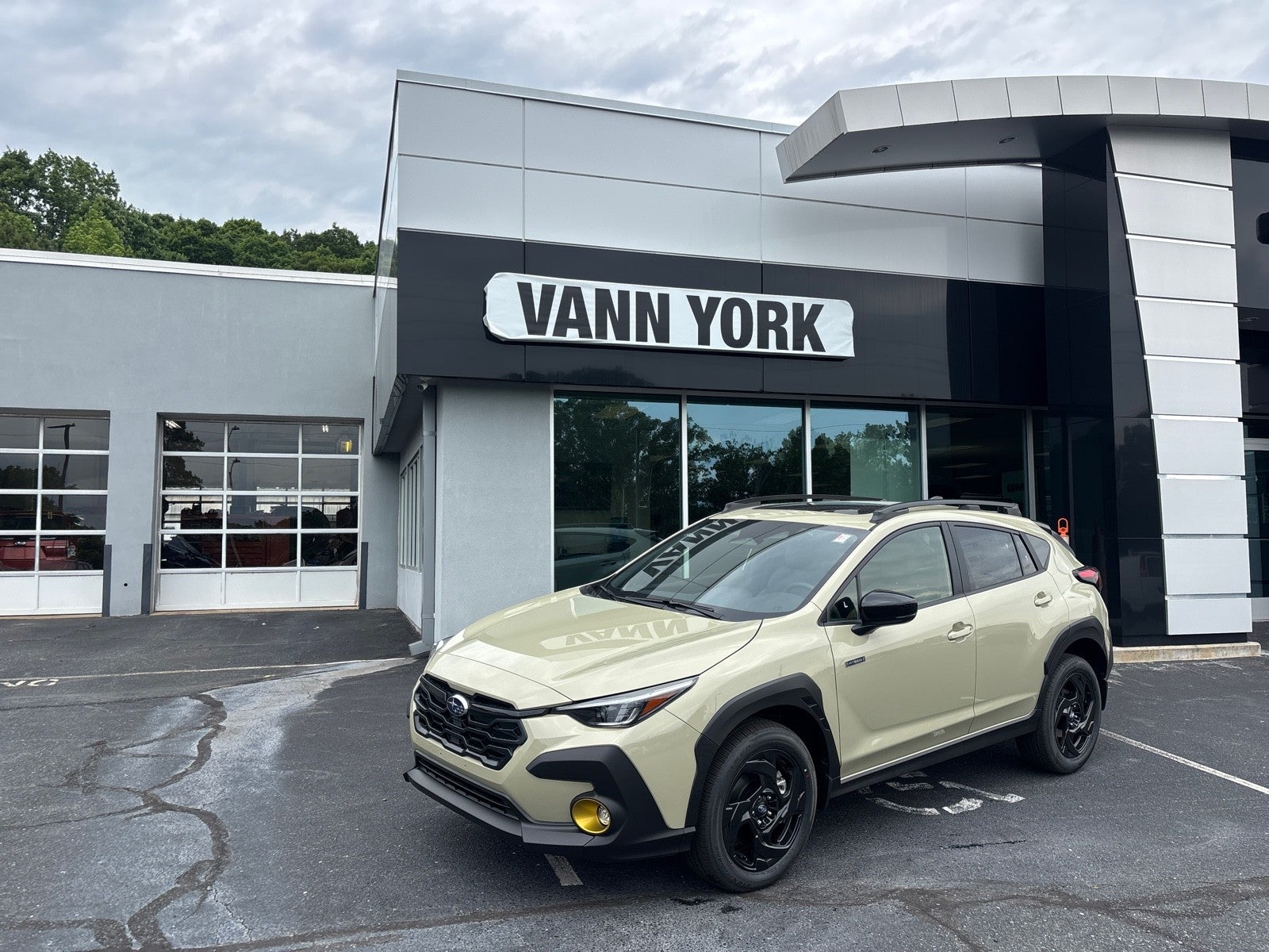 2026 Subaru CROSSTREK Sport Hybrid in Sand Dune Pearl — front three-quarter view