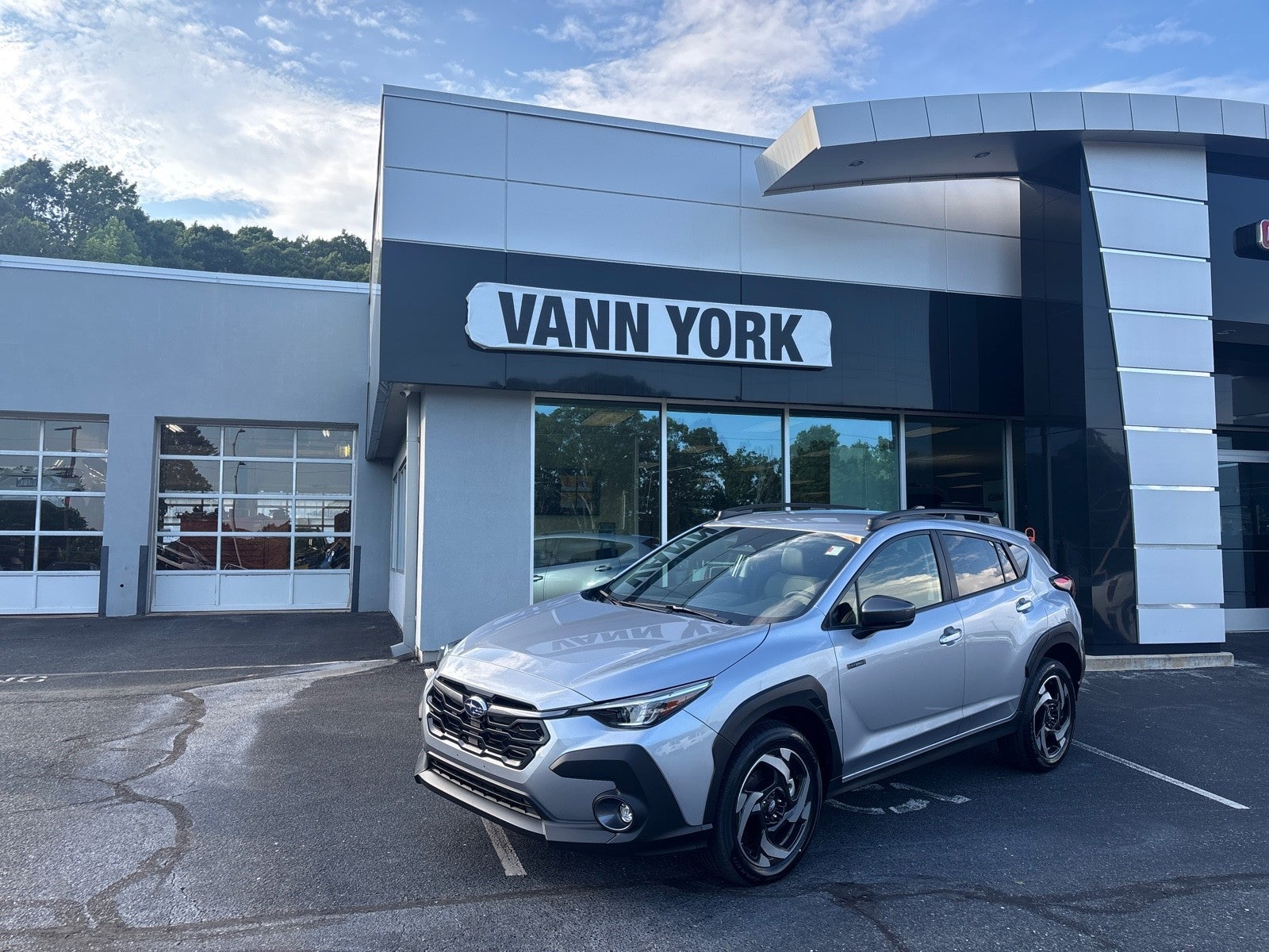2026 Subaru CROSSTREK Limited Hybrid in Ice Silver Metallic — front three-quarter view