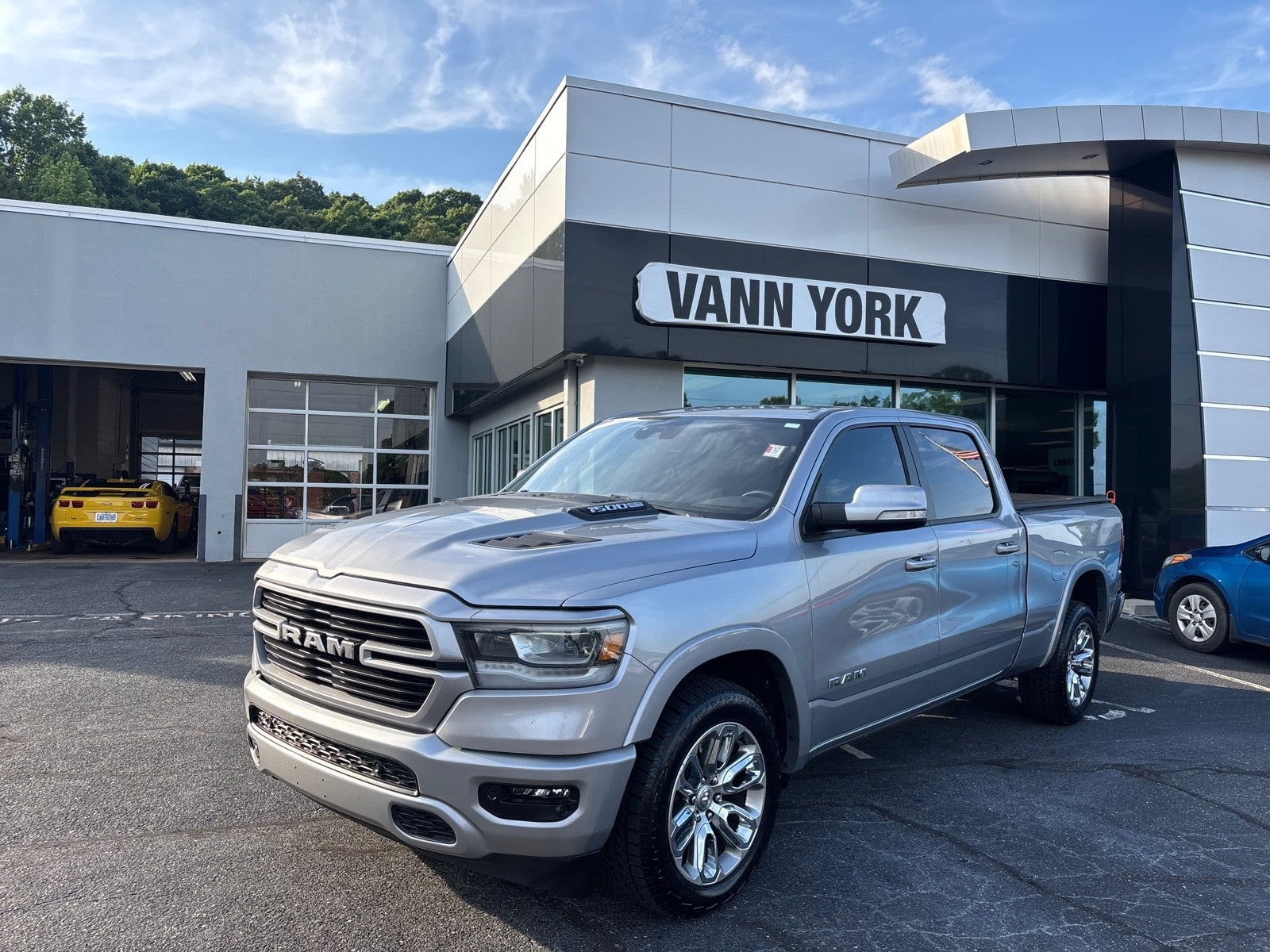 2022 RAM 1500 Laramie in Billet Silver Metallic Clearcoat — front three-quarter view