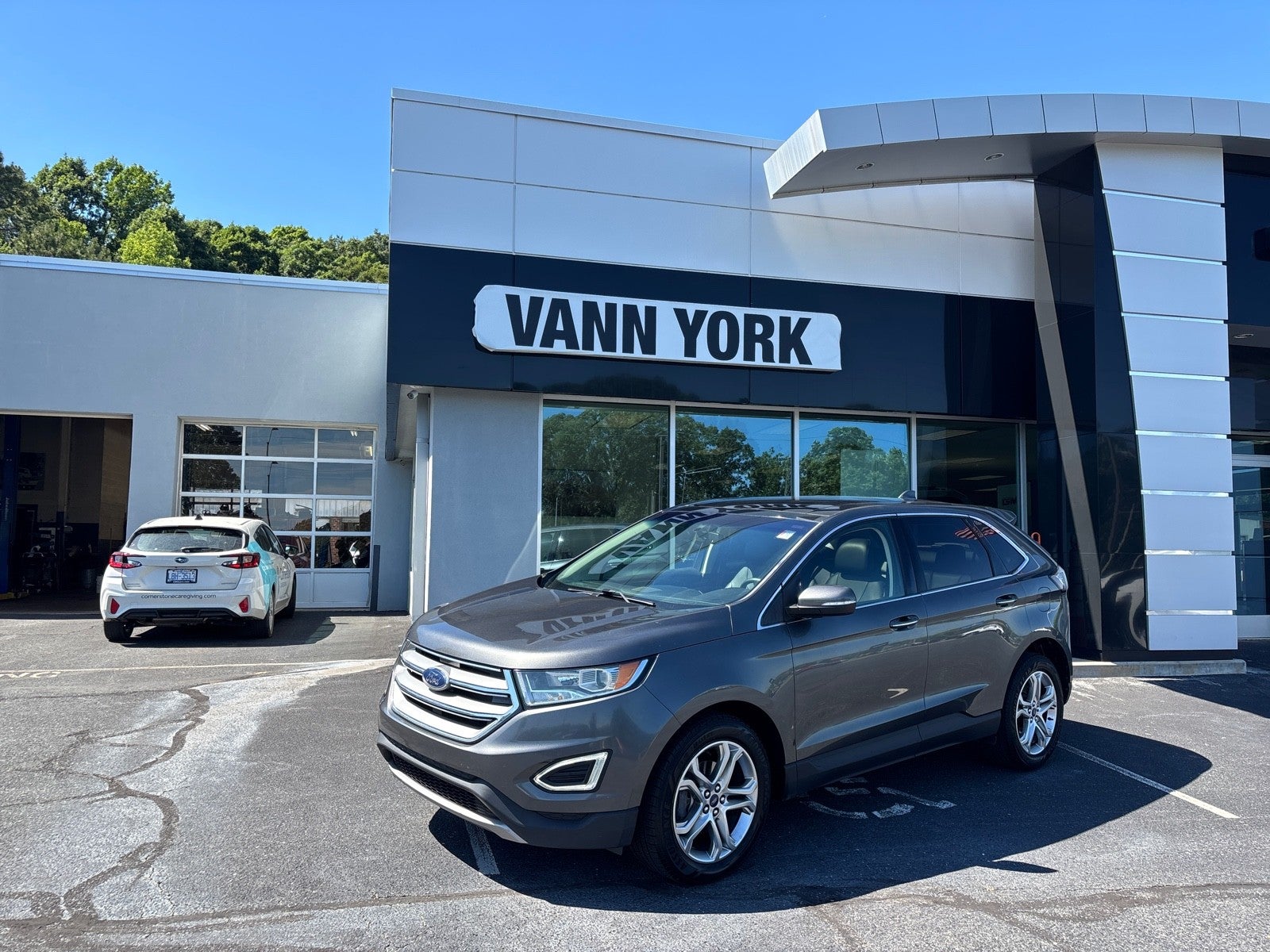 2017 Ford Edge Titanium in Magnetic Metallic — front three-quarter view