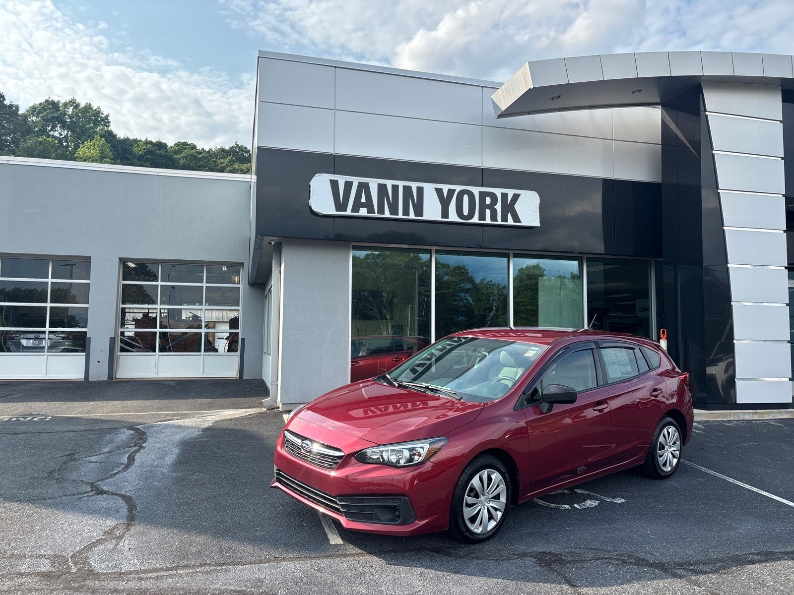 2021 Subaru Impreza 5-door Manual in Crimson Red Pearl — front three-quarter view