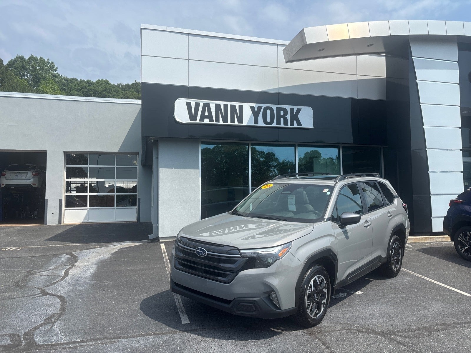 2026 Subaru Forester Premium in River Rock Prl — front three-quarter view