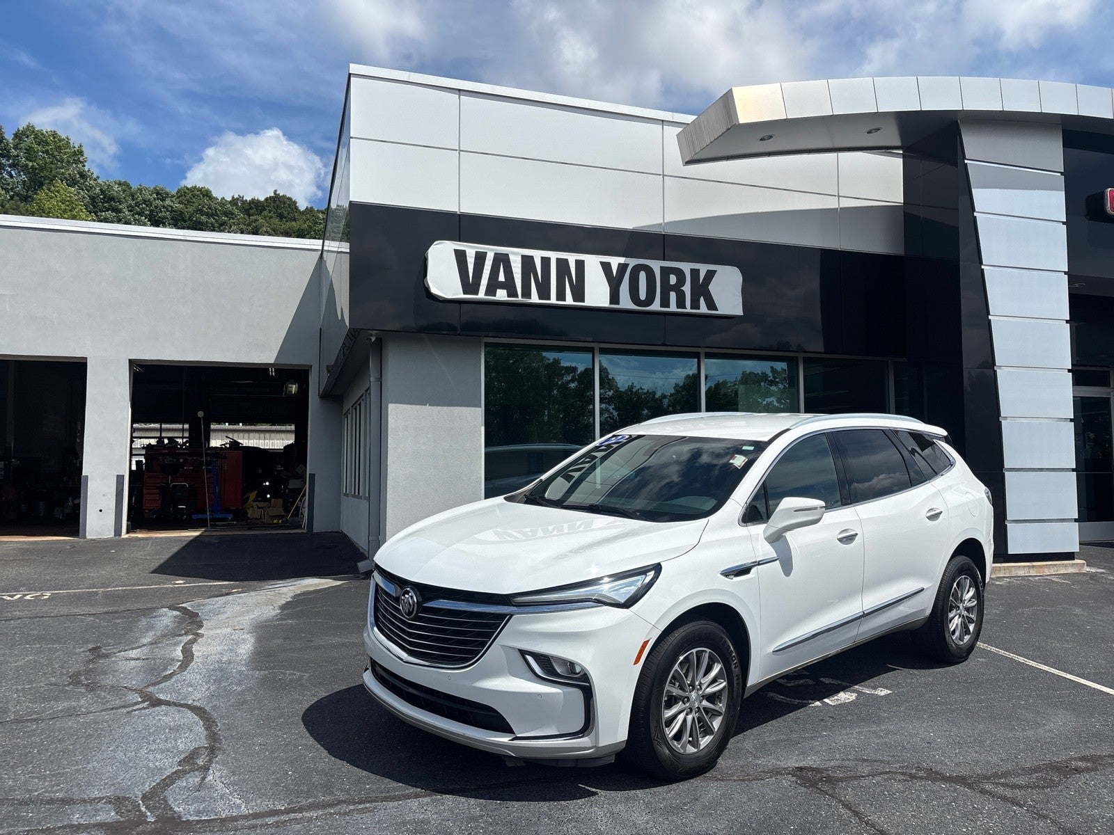 2022 Buick Enclave Essence in White — front three-quarter view