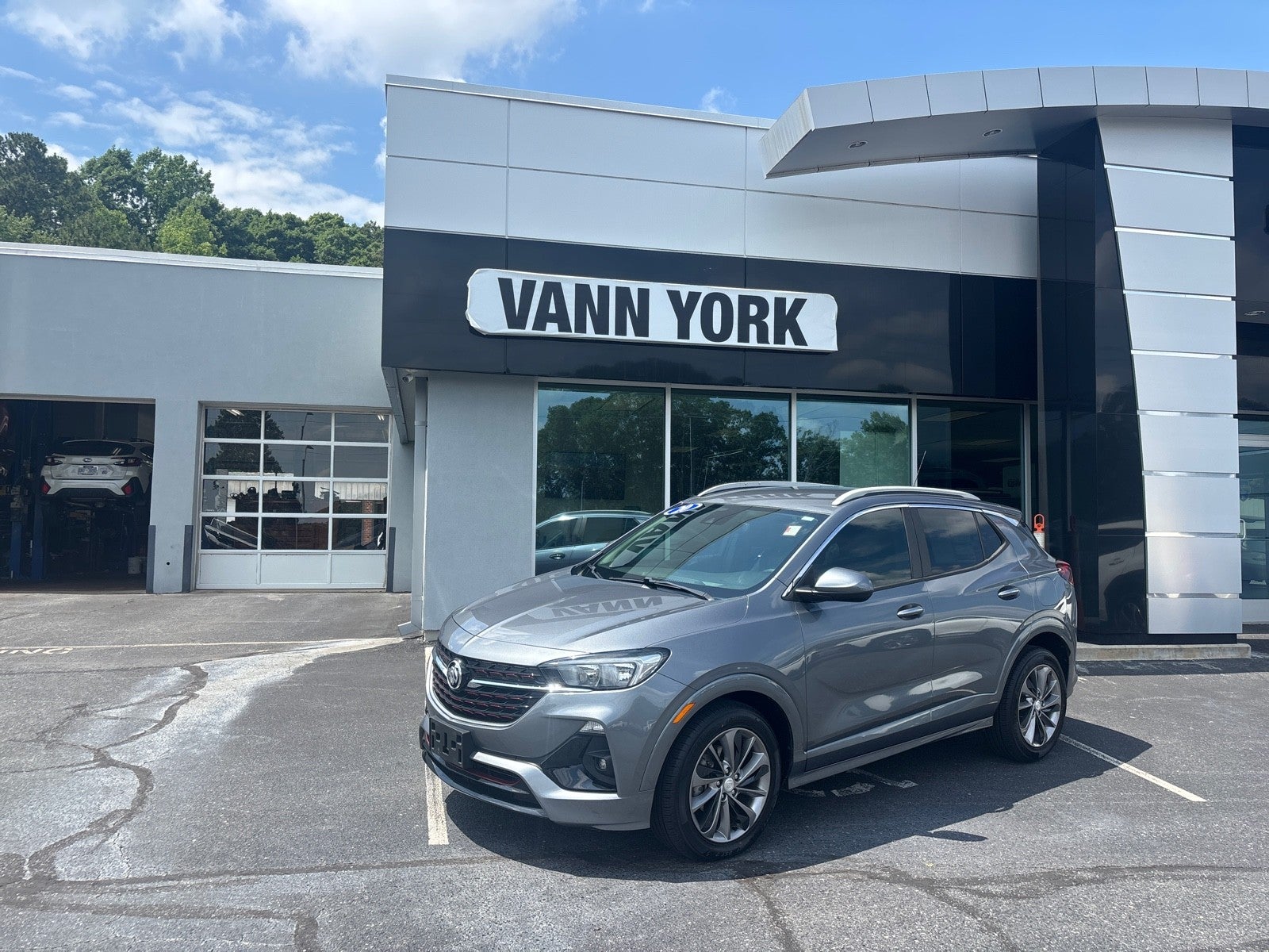 2020 Buick Encore GX Select in Satin Steel Metallic — front three-quarter view
